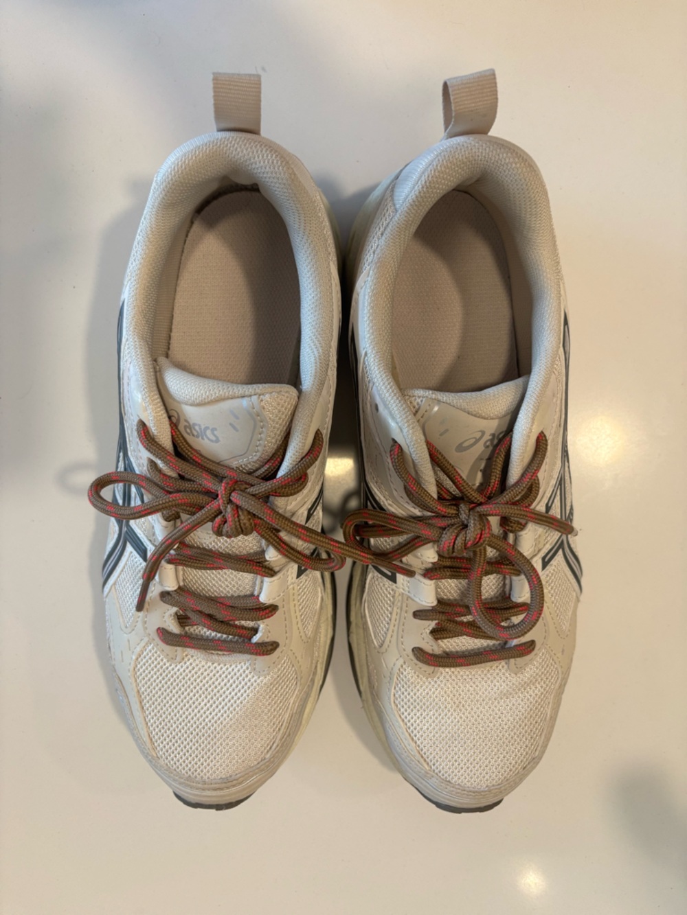 ASICS White Sneakers with Black Accents and Multicolor Laces